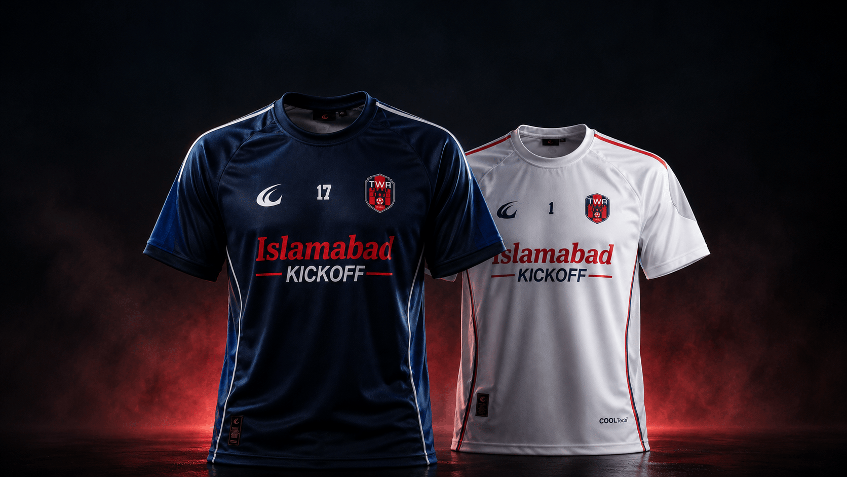 The navy home shirt and the white away shirt side by side under a red haze