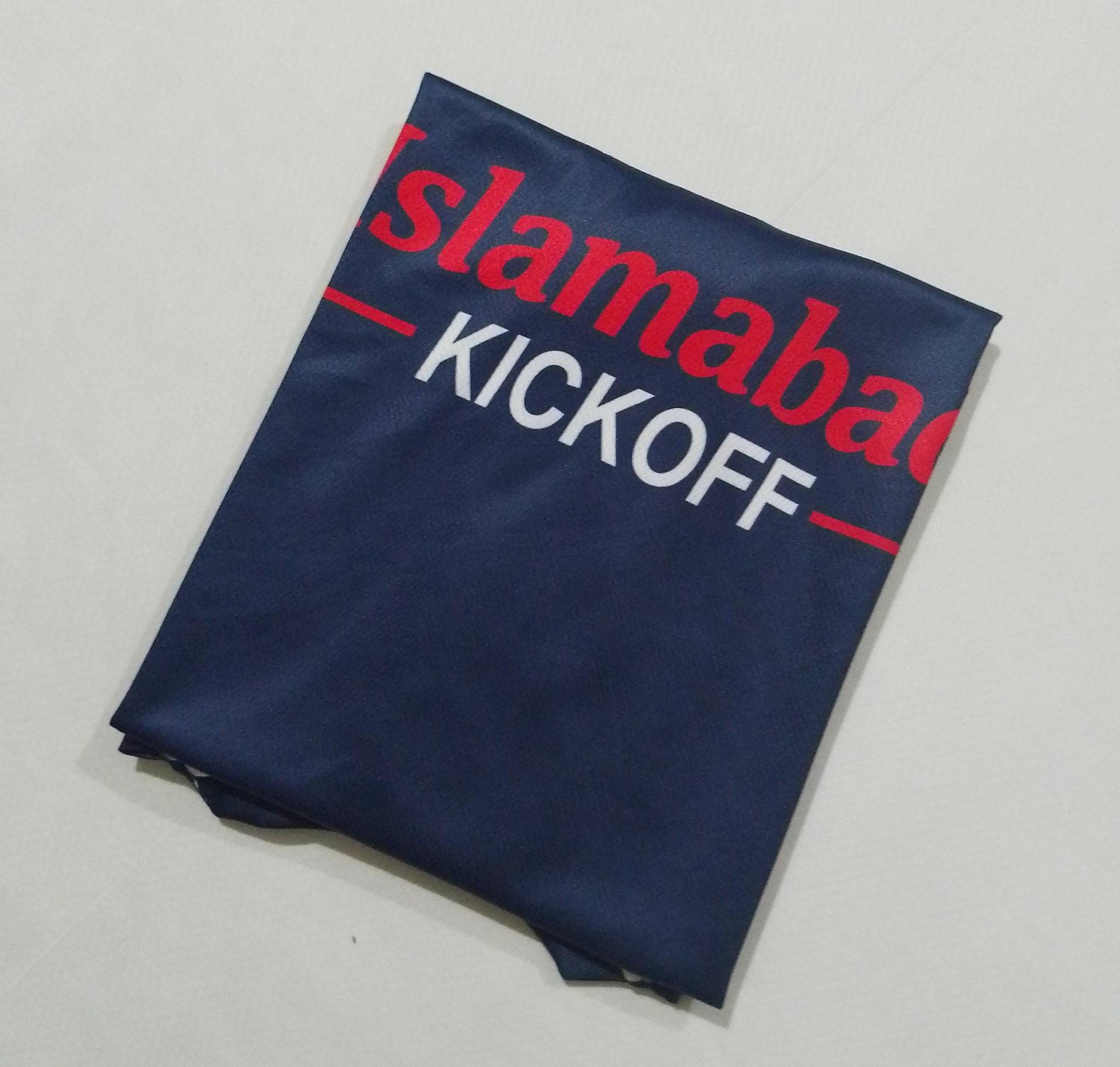 The Islamabad Kickoff sponsor print across the chest of the navy shirt