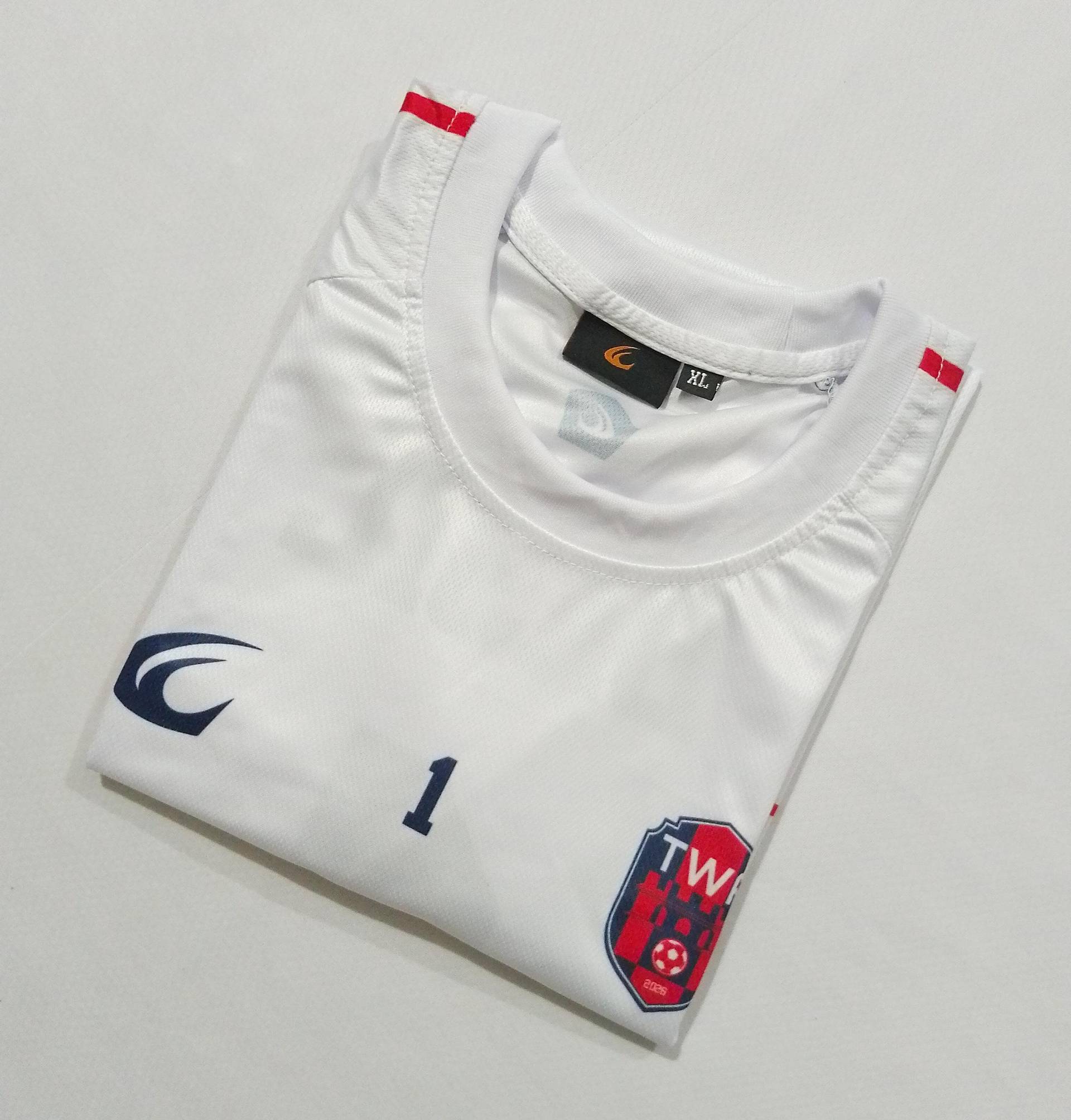 Close-up of the collar and the embroidered TWA crest on the white shirt