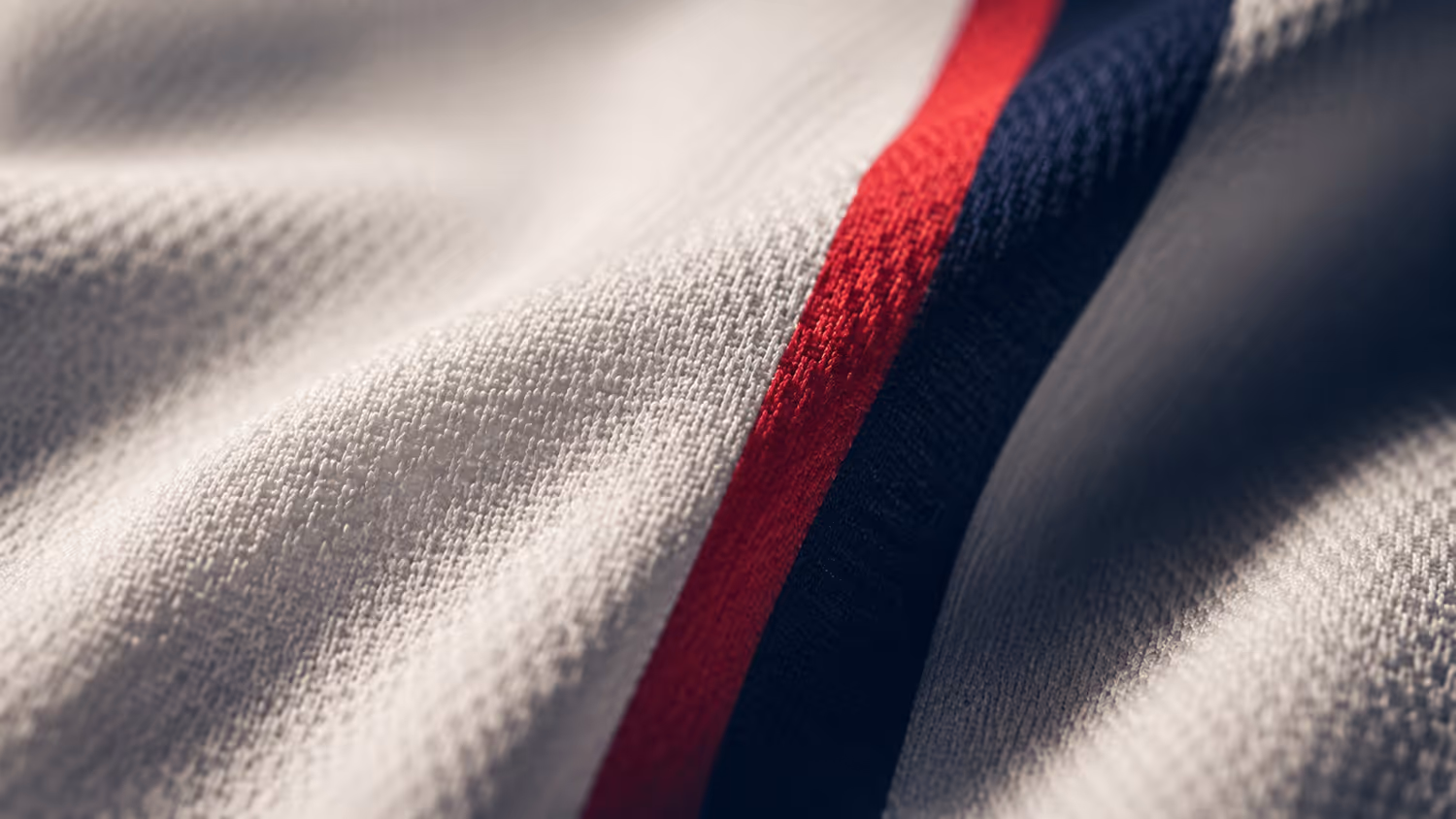A macro shot of the CoolTech mesh fabric the shirts are made from
