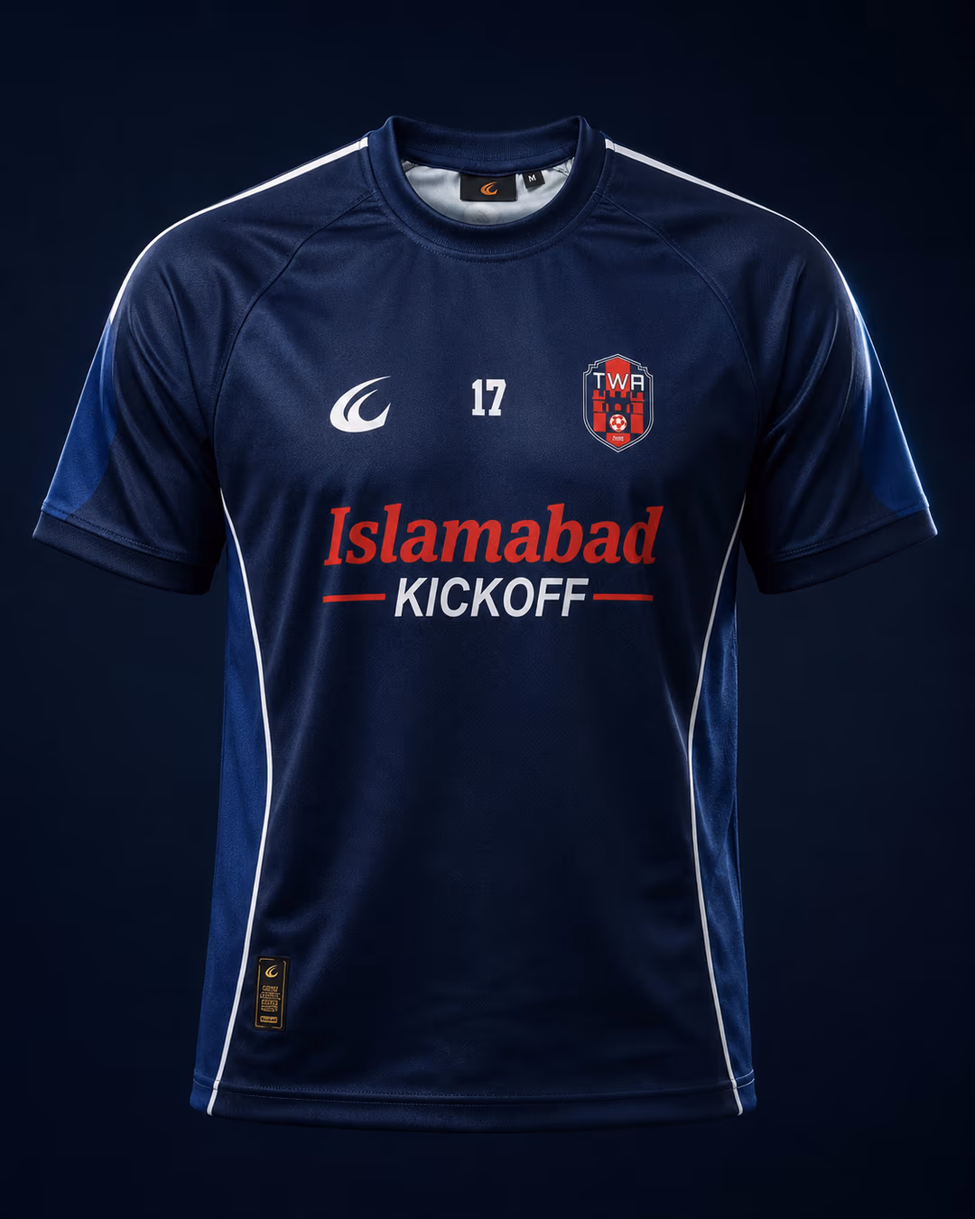 The TWA FC navy home shirt, lit in a dark studio