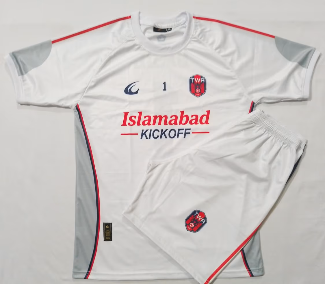 The white away shirt and shorts laid out flat together